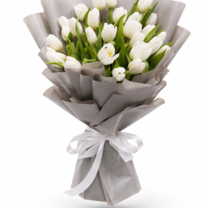 White tulip flower bouquet wrapped in elegant grey paper with a white ribbon, isolated on a pure white background in a premium studio product photo.