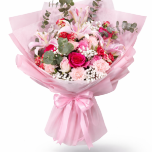 Elegant birthday bouquet with pink lilies and pink roses wrapped in premium paper