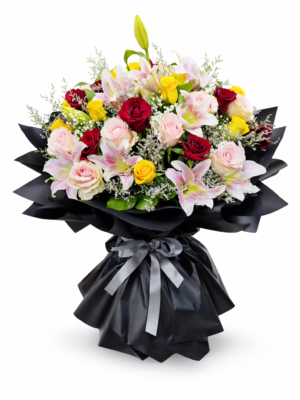 Luxury mixed floral bouquet featuring roses, lilies, and seasonal flowers arranged in elegant black wrapping