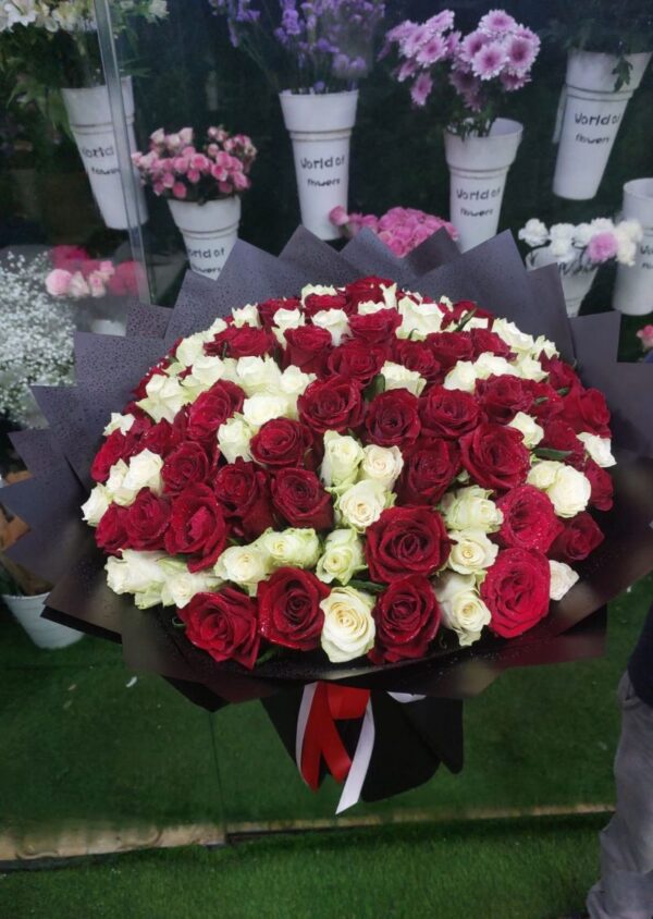 Red and White Rose Bouquet - Fresh and Elegant Floral Arrangement Available for Sale in Dubai.