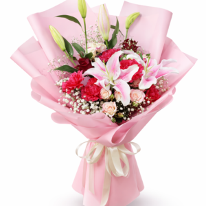 Elegant birthday bouquet with pink lilies, roses, carnations and baby’s breath in soft pink wrapping