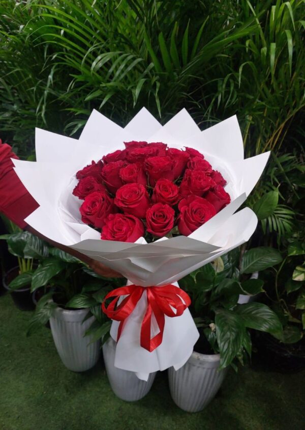 21 Red Roses Bouquet – Freshly Wrapped with White Paper and a Red Ribbon for Special Occasions in Dubai