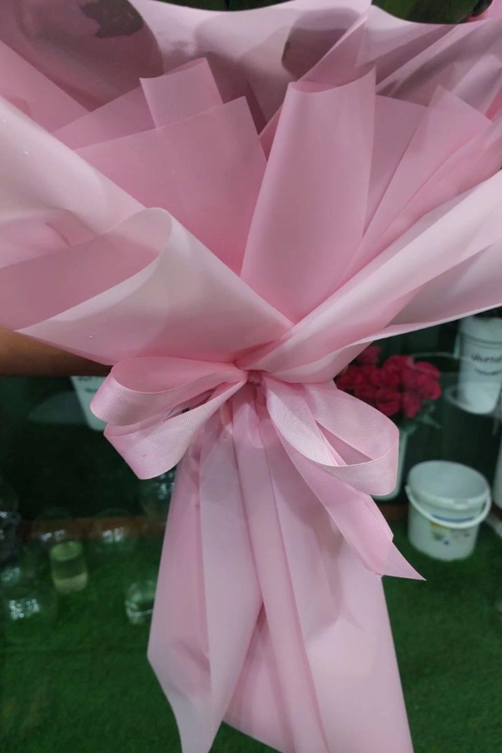 Close-up of premium pink roses with delicate greenery, same-day delivery Dubai & Sharjah