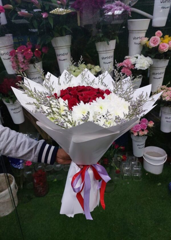 Stunning bouquet of red roses and white chrysanthemums for gifting in Dubai