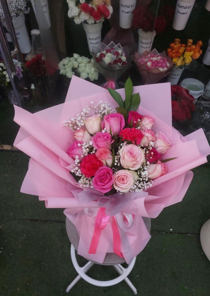 Free flower delivery to Sharjah University with fresh rose bouquet