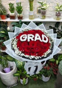 GRAD red rose bouquet for graduation delivery in Sharjah and Ajman