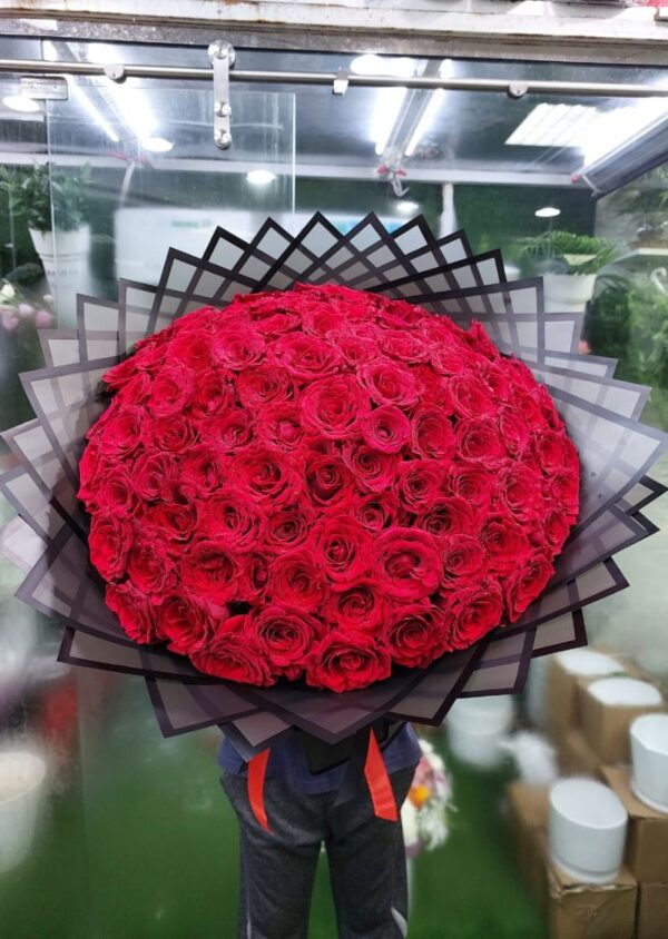 201 red roses bouquet is hand-tied and wrapped in premium black geometric paper for an elegant, modern look. Each rose is carefully selected to ensure long-lasting freshness and vibrant color.
