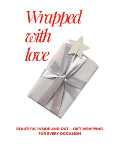 Luxury floral gift wrapping with red ribbon on white box – best gift wrapping Sharjah by Green Plant Flowers
