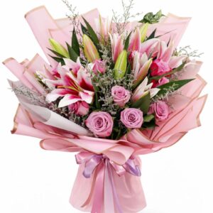 Pink lily and rose bouquet arranged beautifully with fresh flowers