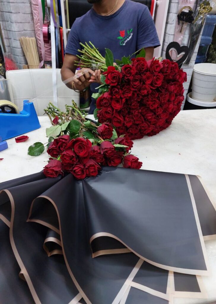Beautifully handcrafted bouquet of red roses, arranged by our expert florist in Dubai for same-day delivery.