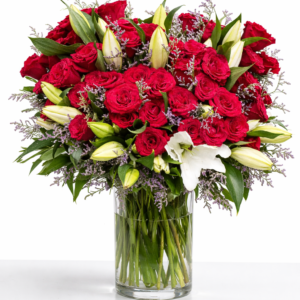 Luxury red roses & white lily bouquet in glass vase for premium flower delivery in Dubai