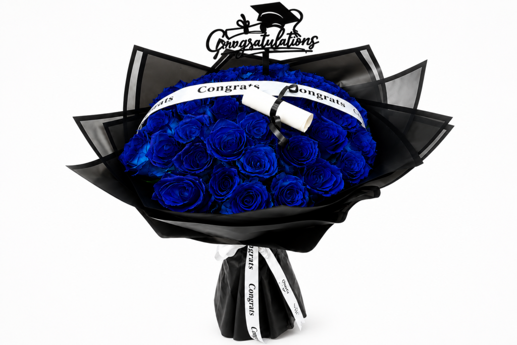 Luxury blue rose graduation bouquet with graduation cap topper and same-day flower delivery in Sharjah, Dubai, and Ajman.