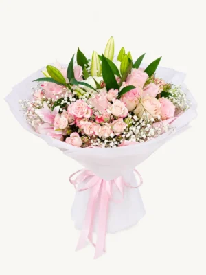 Pink rose and lily bouquet with baby’s breath and greenery