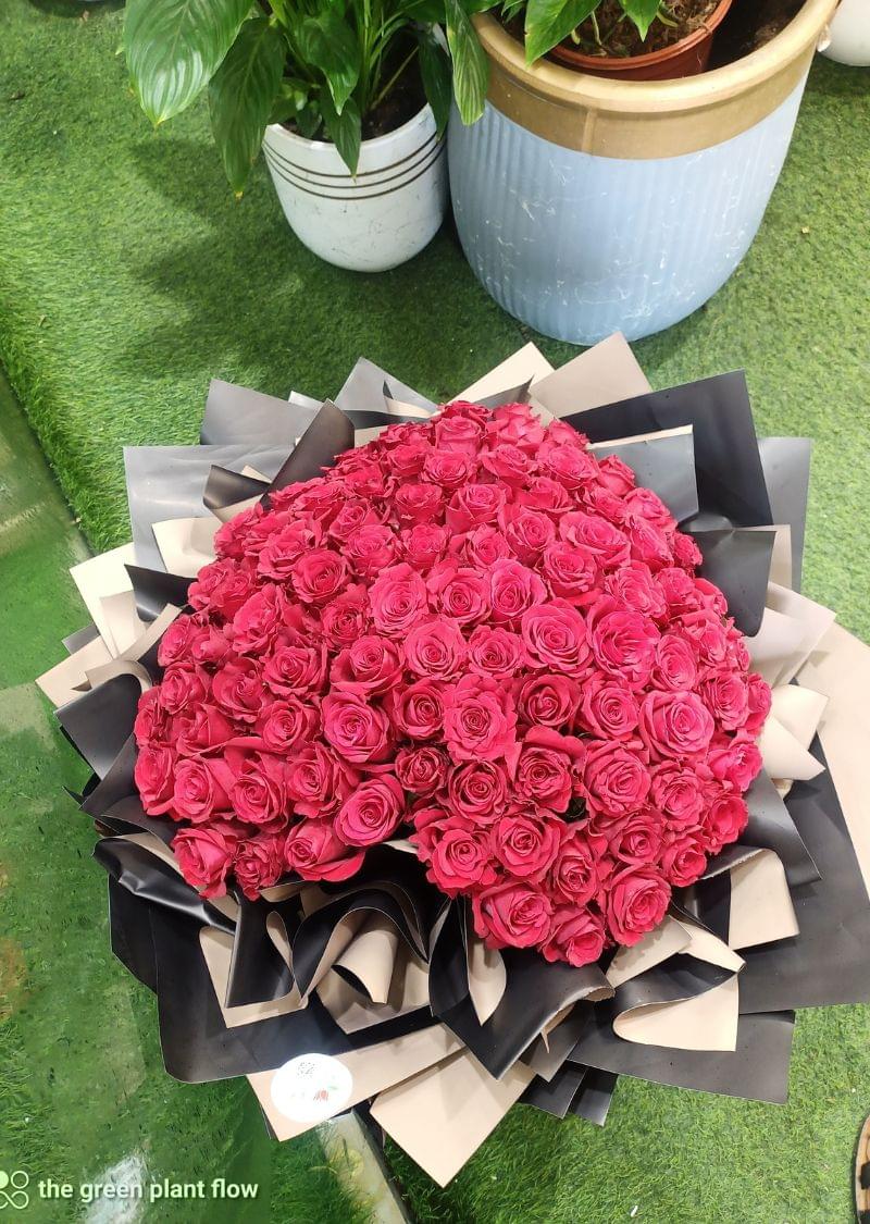 Luxury heart shape bouquet made of fresh red roses with premium wrapping
