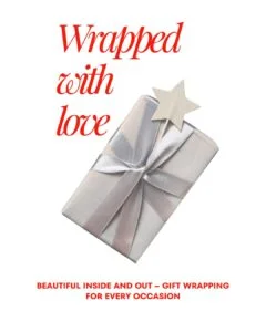 Luxury floral gift wrapping with red ribbon on white box – best gift wrapping Sharjah by Green Plant Flowers