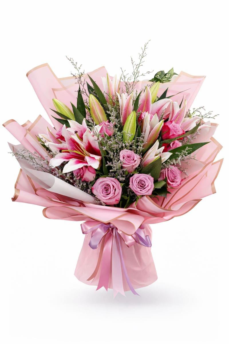 Pink lily and rose bouquet arranged beautifully with fresh flowers