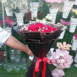 Fresh simple red roses bouquet with hand-picked red roses arranged elegantly, perfect for gifting in Dubai