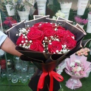 Fresh simple red roses bouquet arranged elegantly, perfect for gifting in Dubai
